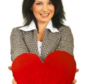 woman holding red heart